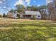 The home is a charming country residence on a spacious lot, perfect for outdoor activities and quiet enjoyment at 265 River Run Rd, Statesville, NC 28625