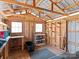 Wood-framed interior with natural light, open design, and versatile space at 265 River Run Rd, Statesville, NC 28625