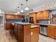 Cozy kitchen offers ample counter space, modern appliances, custom cabinets, and eat-in bar at 265 River Run Rd, Statesville, NC 28625