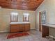 Charming laundry space with wooden accents, ample counter space, and natural light, a perfect blend of comfort and utility at 265 River Run Rd, Statesville, NC 28625
