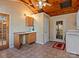 Functional laundry area with sink and natural light, blending practicality with country style elements at 265 River Run Rd, Statesville, NC 28625