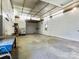 Spacious shop interior featuring a large work area with a sturdy workbench, ready for projects at 265 River Run Rd, Statesville, NC 28625