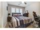 Comfortable bedroom featuring a full bed, bright windows, and neutral decor, creating a relaxing retreat at 2719 Selwyn Ave # 6, Charlotte, NC 28209