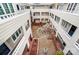 Overhead view of courtyard area with patios and a flowering tree at 2719 Selwyn Ave # 6, Charlotte, NC 28209