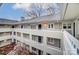 Exterior view of a multi-story apartment complex with balconies at 2719 Selwyn Ave # 6, Charlotte, NC 28209