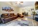 Bright living room featuring a comfortable leather sofa, modern decor, and a view into the dining area, perfect for entertaining at 2719 Selwyn Ave # 6, Charlotte, NC 28209
