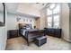Inviting bedroom with a tall window, offering lots of natural light and a peaceful atmosphere for restful nights at 2719 Selwyn Ave # 6, Charlotte, NC 28209