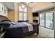 Stylish bedroom with sliding doors to a private balcony and large windows, creating a tranquil and airy space at 2719 Selwyn Ave # 6, Charlotte, NC 28209