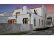 Stunning modern home featuring clean lines, a rooftop terrace, and large windows, offering stylish living at 2818 Kenwood Sharon Ln, Charlotte, NC 28211