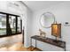 Bright foyer featuring a horse statue, hardwood floors, and a glimpse of the front yard at 2818 Kenwood Sharon Ln, Charlotte, NC 28211