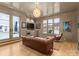Inviting living room boasts natural light, stylish furnishings, and hardwood floors at 2818 Kenwood Sharon Ln, Charlotte, NC 28211