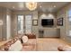 Stylish living room highlighting a modern sofa, built-in bar, and chic decor at 2818 Kenwood Sharon Ln, Charlotte, NC 28211