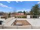 Inviting rooftop patio with comfortable seating, outdoor rug and neighborhood views on a sunny day at 2818 Kenwood Sharon Ln, Charlotte, NC 28211