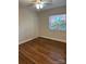 Bedroom featuring hardwood flooring, closet, and natural light at 2921 Fort St, Charlotte, NC 28205