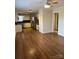 Open kitchen featuring stainless steel appliances and wood flooring at 2921 Fort St, Charlotte, NC 28205
