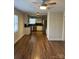 Cozy kitchen area with stainless steel appliances, white cabinets, and wood floors at 2921 Fort St, Charlotte, NC 28205