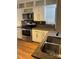 Kitchen area featuring stainless steel appliances, white cabinets at 2921 Fort St, Charlotte, NC 28205