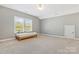 Neutral bedroom with carpet, single bed, and large window at 2934 Hiddenbrook Way, Fort Mill, SC 29707