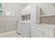 Laundry room featuring washer, dryer, sink, and cabinets at 2934 Hiddenbrook Way, Fort Mill, SC 29707