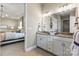 Primary bathroom with double vanity and granite countertops at 305 Basil Dr, Indian Trail, NC 28079