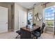 Home office featuring natural light, a large desk, and neutral tones at 305 Basil Dr, Indian Trail, NC 28079