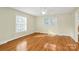 Bright bedroom with hardwood floors, natural light, and a neutral color palette at 3200 Highview Rd, Charlotte, NC 28210