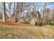 Well-maintained home with mature trees and lush lawn at 3200 Highview Rd, Charlotte, NC 28210