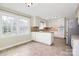 Spacious eat-in kitchen with tile flooring and stainless steel appliances and attached breakfast area at 3200 Highview Rd, Charlotte, NC 28210