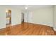 Large main bedroom featuring wood floors and a view of the ensuite bathroom at 3200 Highview Rd, Charlotte, NC 28210