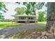 Charming home featuring a covered porch, stone steps and a brick chimney at 3640 Oak Haven Ln, Shelby, NC 28150