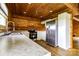 Bright kitchen featuring stainless steel refrigerator and white cabinets at 3640 Oak Haven Ln, Shelby, NC 28150