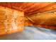 Spacious living room featuring knotty pine wood and carpet flooring at 3640 Oak Haven Ln, Shelby, NC 28150