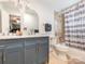 Well-lit bathroom with double vanity, modern fixtures, and a shower-tub combination at 3711 Davis Dr, Charlotte, NC 28270
