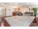 Spacious living room with hardwood floors and an open floorplan to the dining area at 3711 Davis Dr, Charlotte, NC 28270