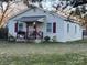 Charming one-story home with a cozy front porch and red accents at 374 Baker St, Rock Hill, SC 29730