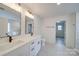 Bathroom features double sink vanity with marble floors and bronze hardware at 433 Annaberg Ln, Monroe, NC 28110