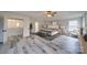 Spacious main bedroom features a trey ceiling, ceiling fan, and ensuite bath at 433 Annaberg Ln, Monroe, NC 28110