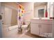 bathroom features a tub and shower combination and a colorful shower curtain at 508 Tayberry Ln, Fort Mill, SC 29715