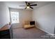 Cozy Bedroom with a crib and neutral colored walls at 508 Tayberry Ln, Fort Mill, SC 29715