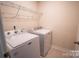 Laundry room with white washer and dryer at 508 Tayberry Ln, Fort Mill, SC 29715