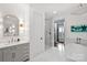 Beautiful bathroom featuring marble floors, walk-in shower, soaking tub, double vanity, and modern fixtures at 5231 Lila Wood Cir, Charlotte, NC 28209