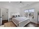 Well-lit bedroom featuring a large window and a modern bed at 5231 Lila Wood Cir, Charlotte, NC 28209