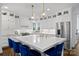 Bright kitchen featuring a large island, pendant lights, and stainless steel appliances at 5231 Lila Wood Cir, Charlotte, NC 28209
