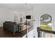 Second-floor sitting area featuring a large arch window with views of the front yard at 5231 Lila Wood Cir, Charlotte, NC 28209
