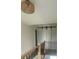 Hallway with barn doors and wood and metal railing, showcasing modern design elements at 56 Linneys Mountain Rd, Taylorsville, NC 28681
