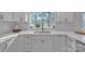 Bright kitchen with updated cabinetry and gold hardware at 56 Linneys Mountain Rd, Taylorsville, NC 28681