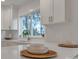 Bright kitchen with an undermount sink and white countertops at 56 Linneys Mountain Rd, Taylorsville, NC 28681