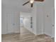 Open living room with modern flooring, fresh white walls, and lots of light at 56 Linneys Mountain Rd, Taylorsville, NC 28681