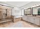 Spa-like bathroom with soaking tub, walk-in shower, and double sink vanity at 618 Bannerman Ln, Fort Mill, SC 29715