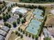 Aerial view of the community pool and tennis courts, offering a variety of recreational options at 618 Bannerman Ln, Fort Mill, SC 29715